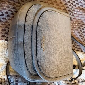 kate spade Pebbled Leather Crossbody in Light Gray with Gold Logo